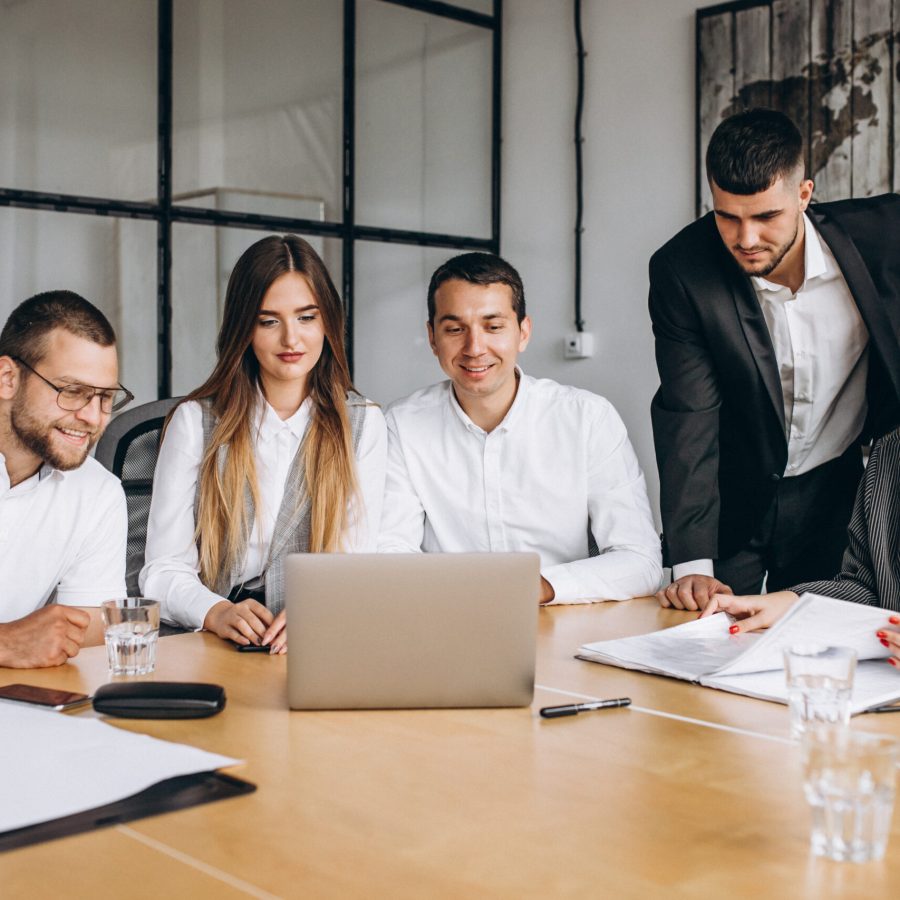 Group of people working out business plan in an office